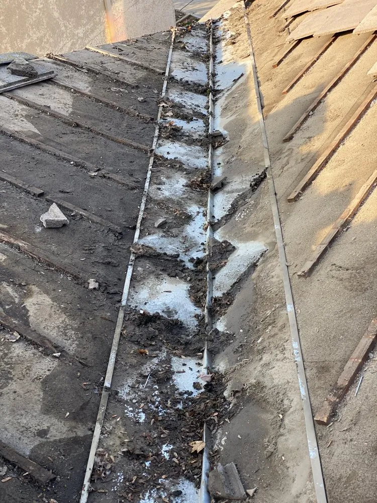 Slide of Octavio Sajuan Roofing