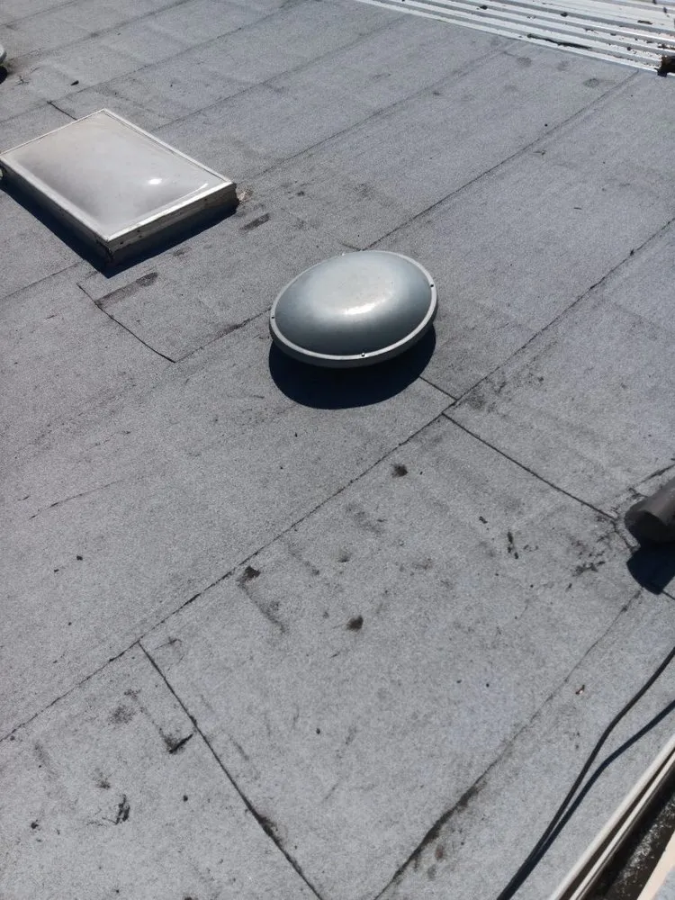 Slide of Off The Roof Roofing