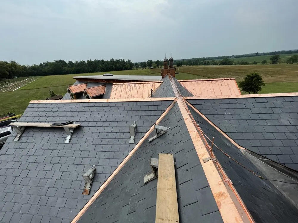 Slide of OGT Roofing