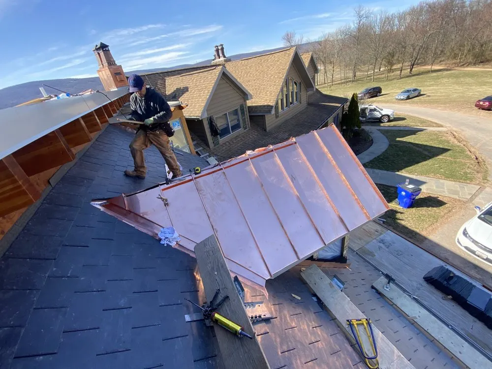 Slide of OGT Roofing