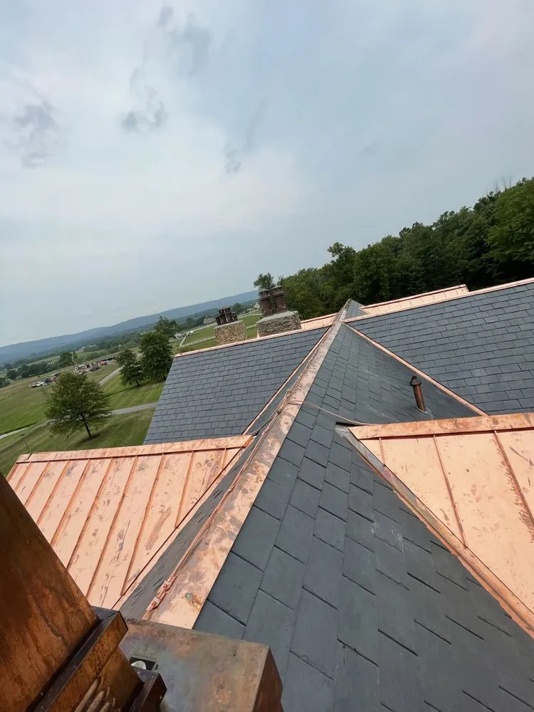 Slide of OGT Roofing