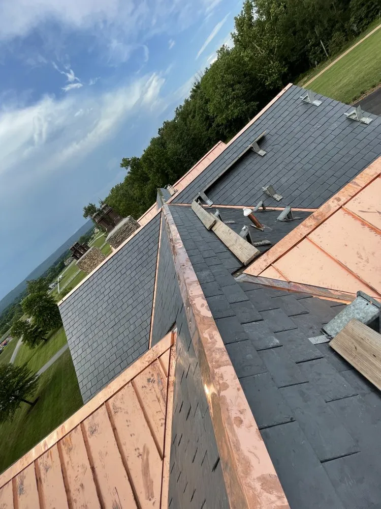 Slide of OGT Roofing