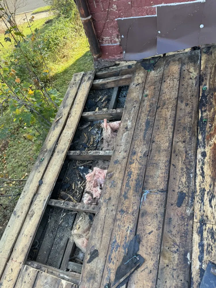 Slide of OGT Roofing