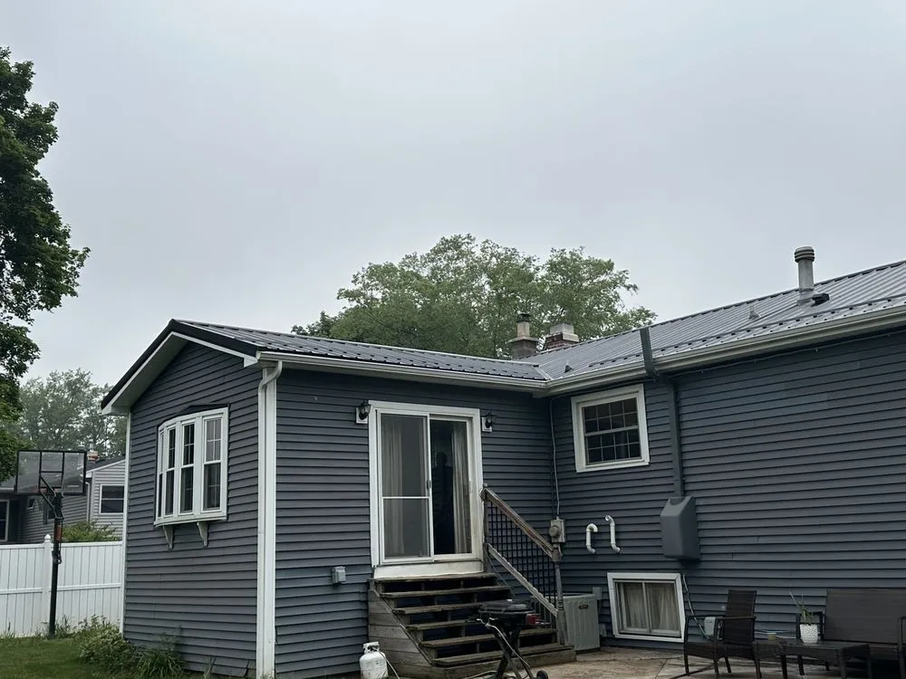 Professional storm damage roof repair in Bliss, NY by O'Hare Construction