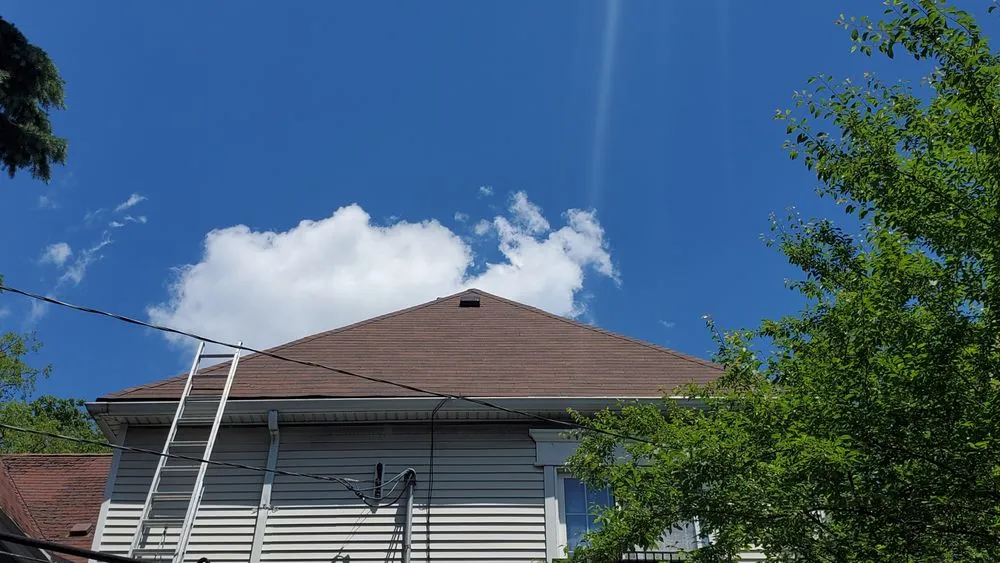 Slide of O'Hare Roofing Storm Masters