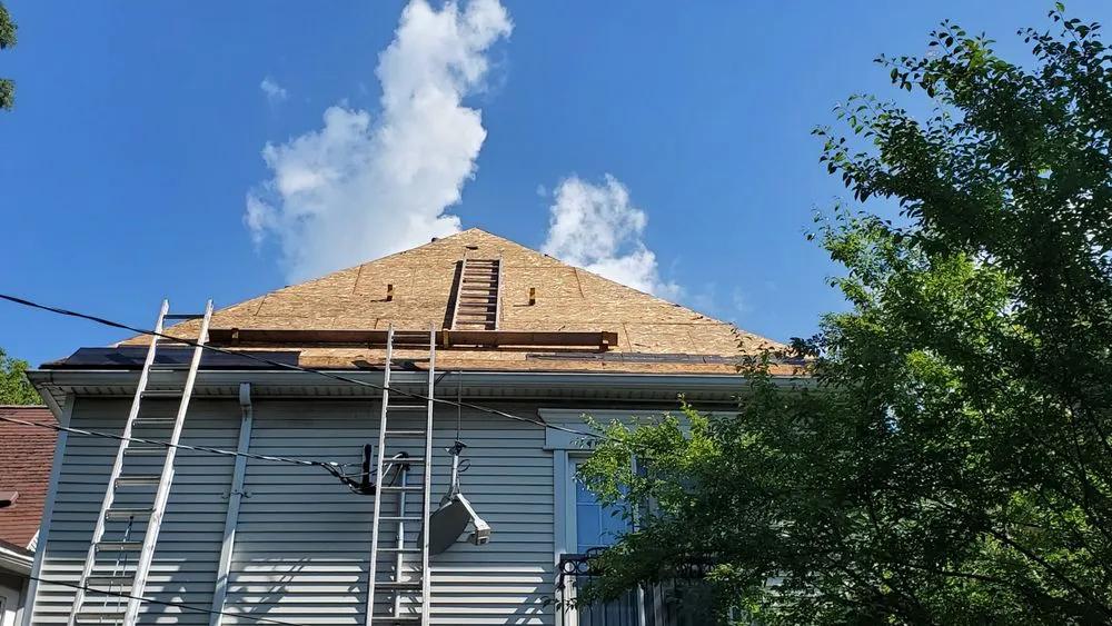 Slide of O'Hare Roofing Storm Masters