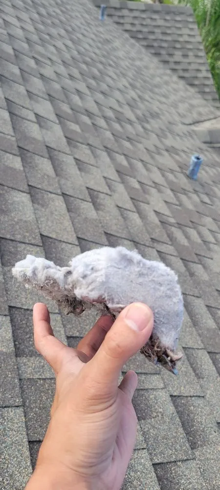 Slide of O'Hare Roofing Storm Masters