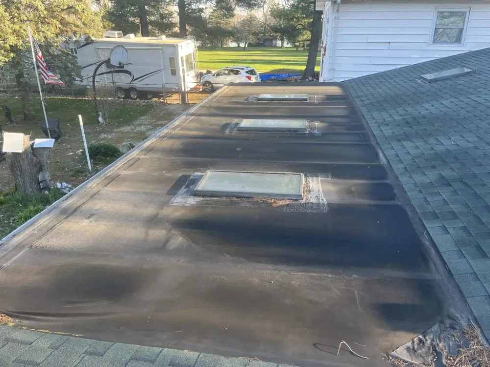Slide of Ohime's Roofing construction and more