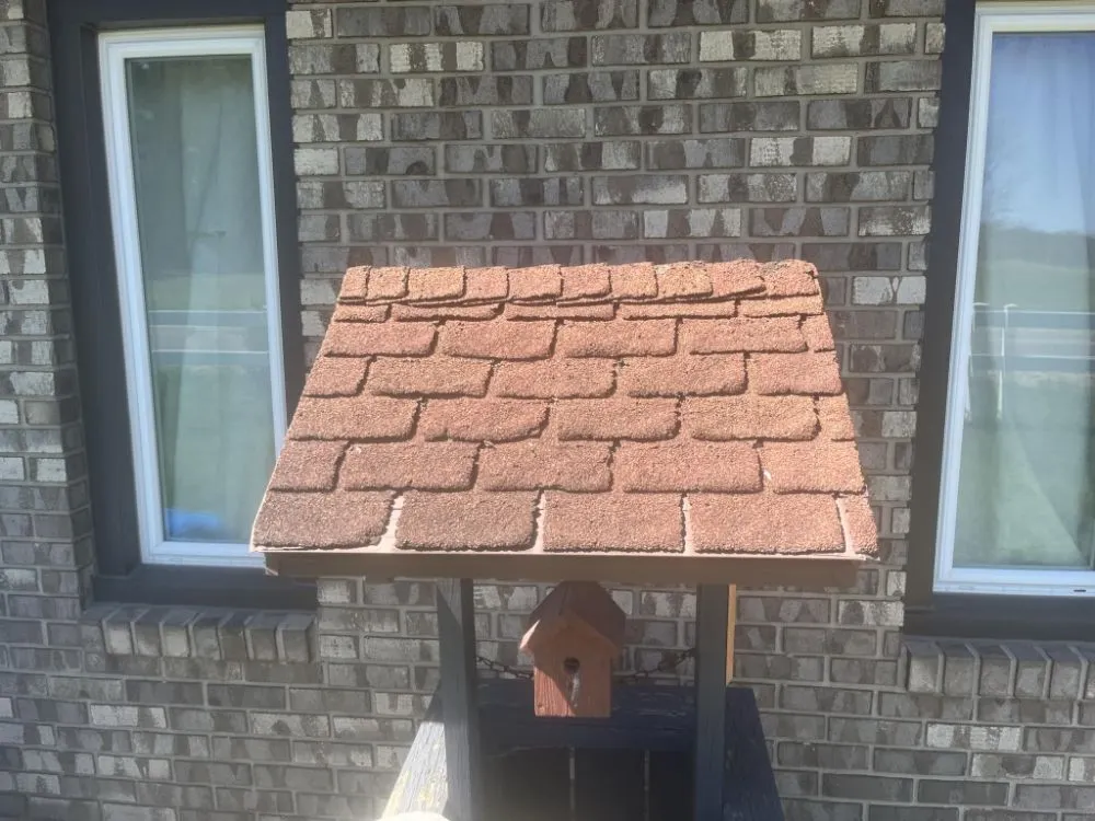 Slide of Ohime's Roofing construction and more