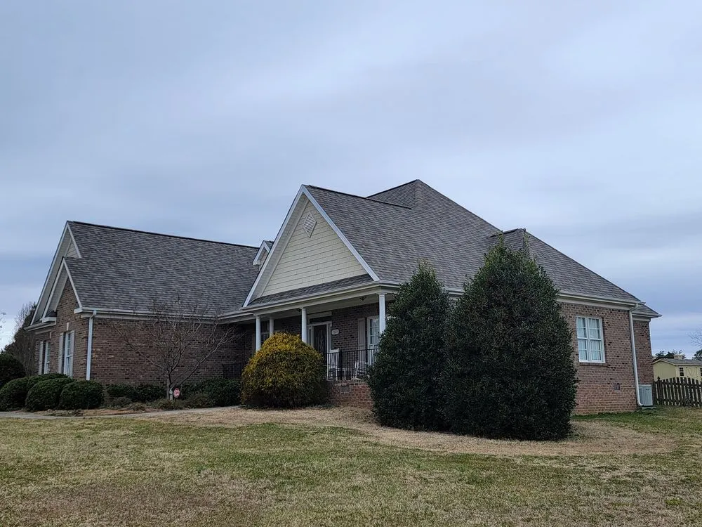 Slide of Old Timers Roofing