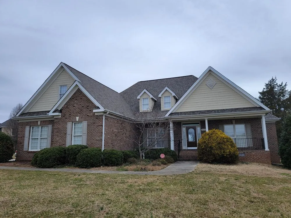 Slide of Old Timers Roofing