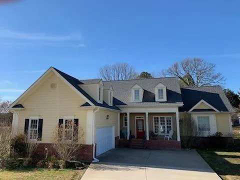 Slide of Old Timers Roofing