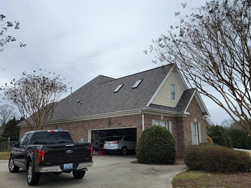 Slide of Old Timers Roofing