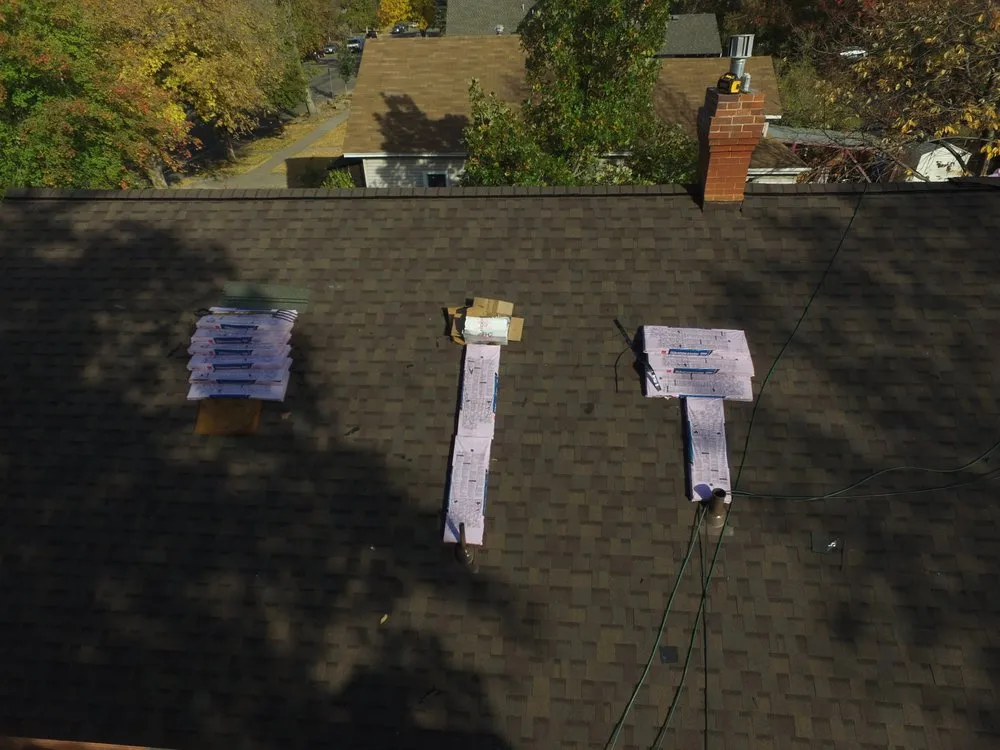 Slide of Old Town Roofer