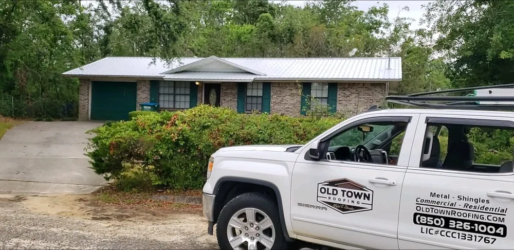 Slide of Old Town Roofing