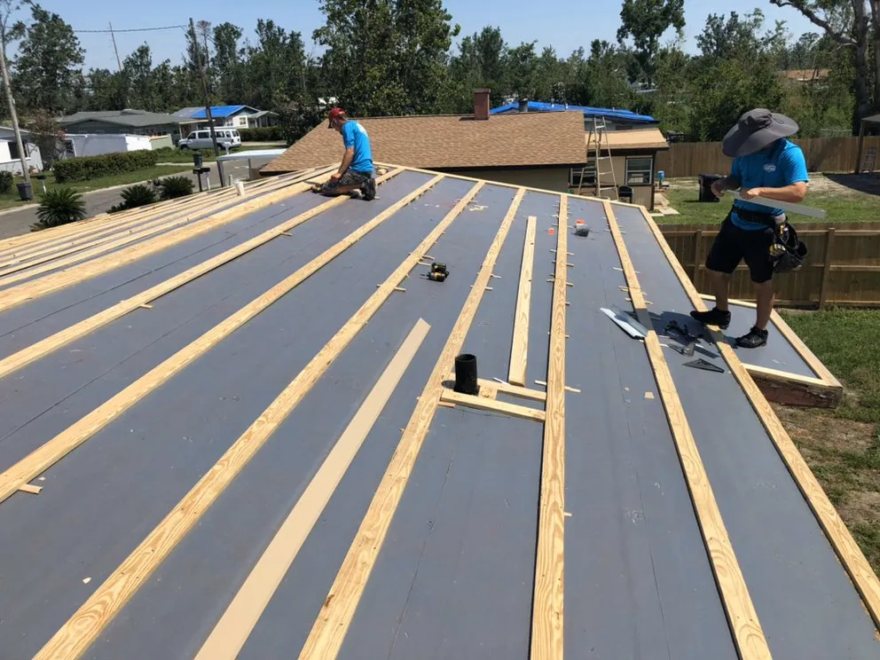 Slide of Old Town Roofing