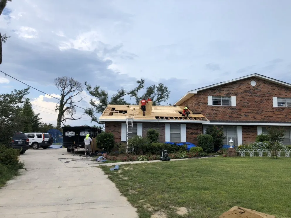 Slide of Old Town Roofing