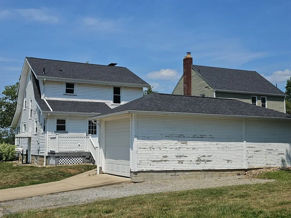 Slide of Olde Hickory Roofing and Gutters