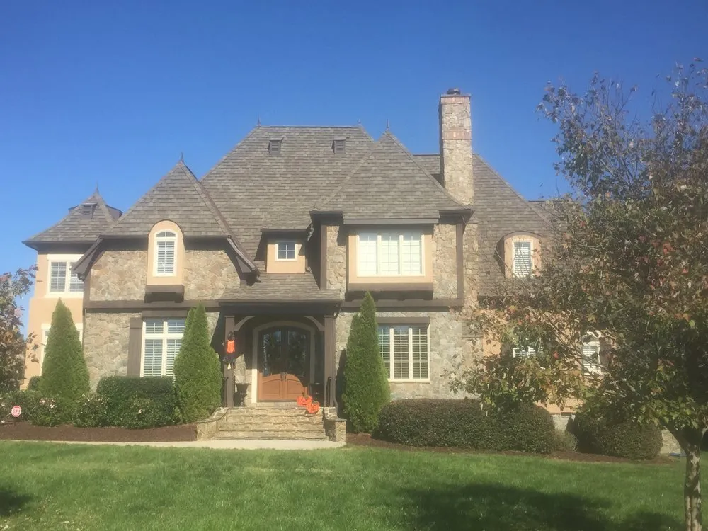 Slide of Olde South Roof and Home