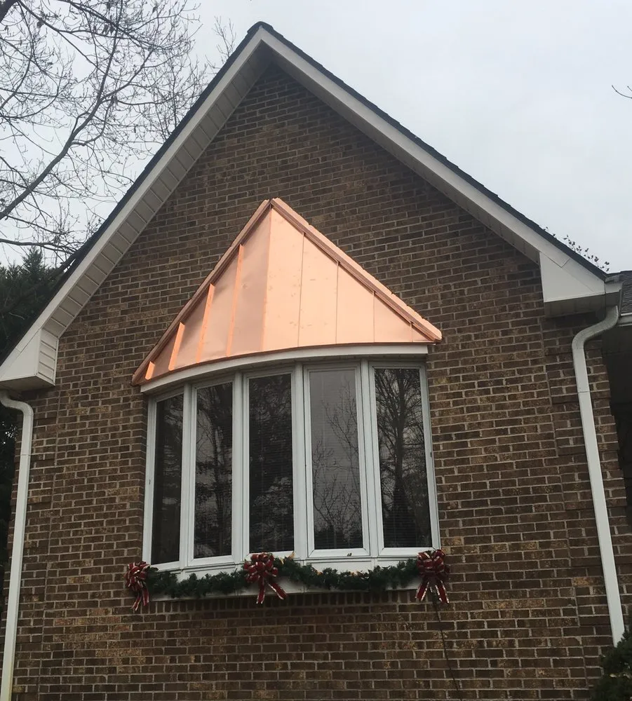 Slide of Olde South Roof and Home