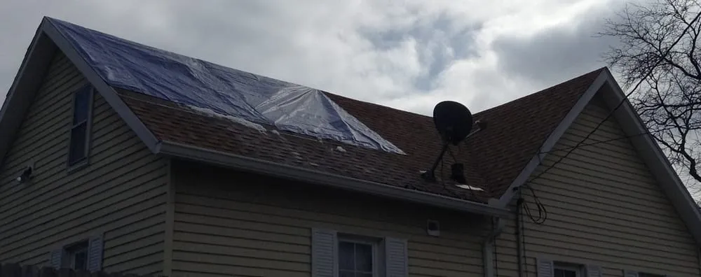 Slide of Olde Town Roofing