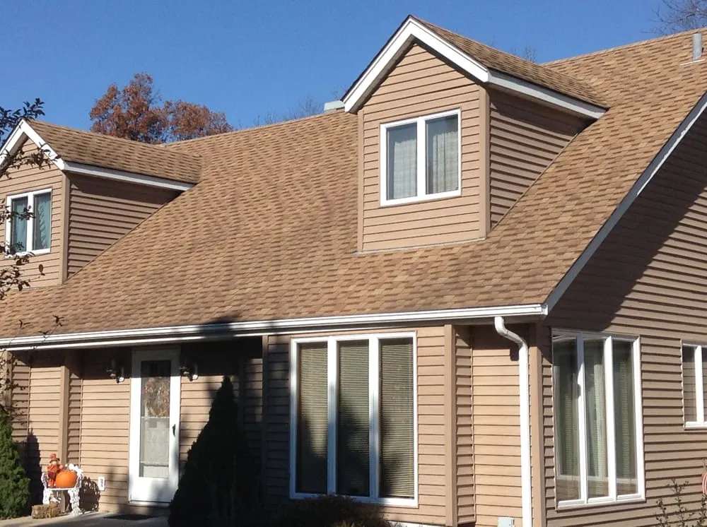 Slide of Olde Town Roofing