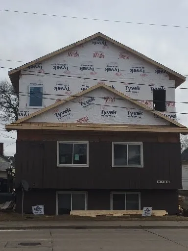 Slide of Olde Town Roofing
