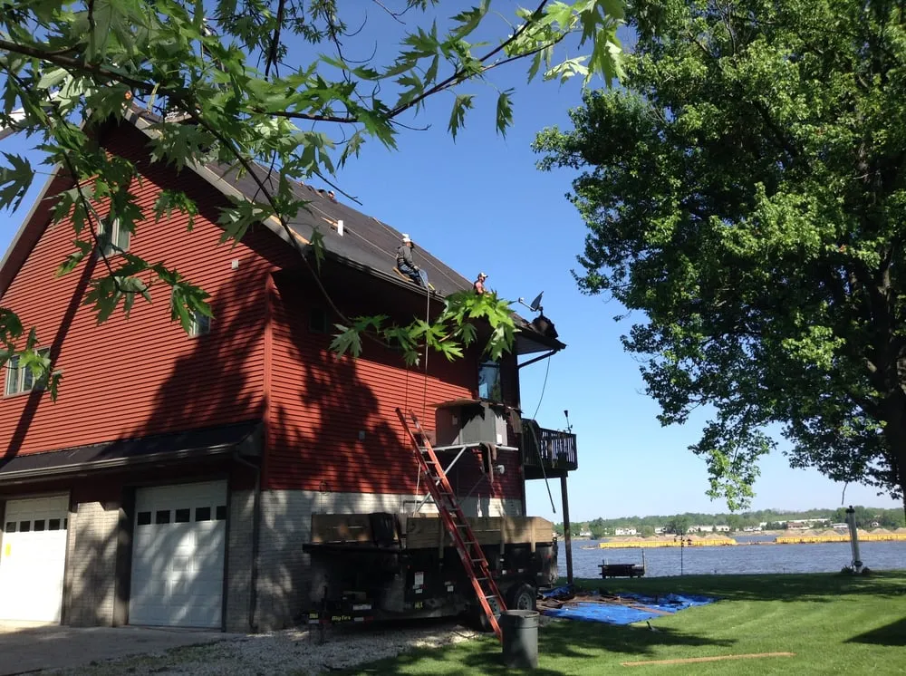 Slide of Olde Town Roofing