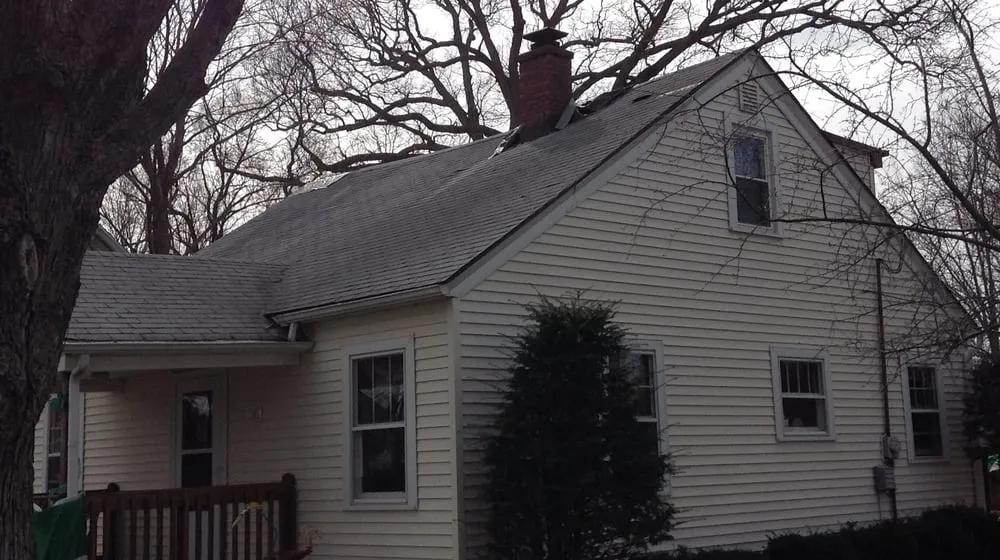 Slide of Olde Town Roofing