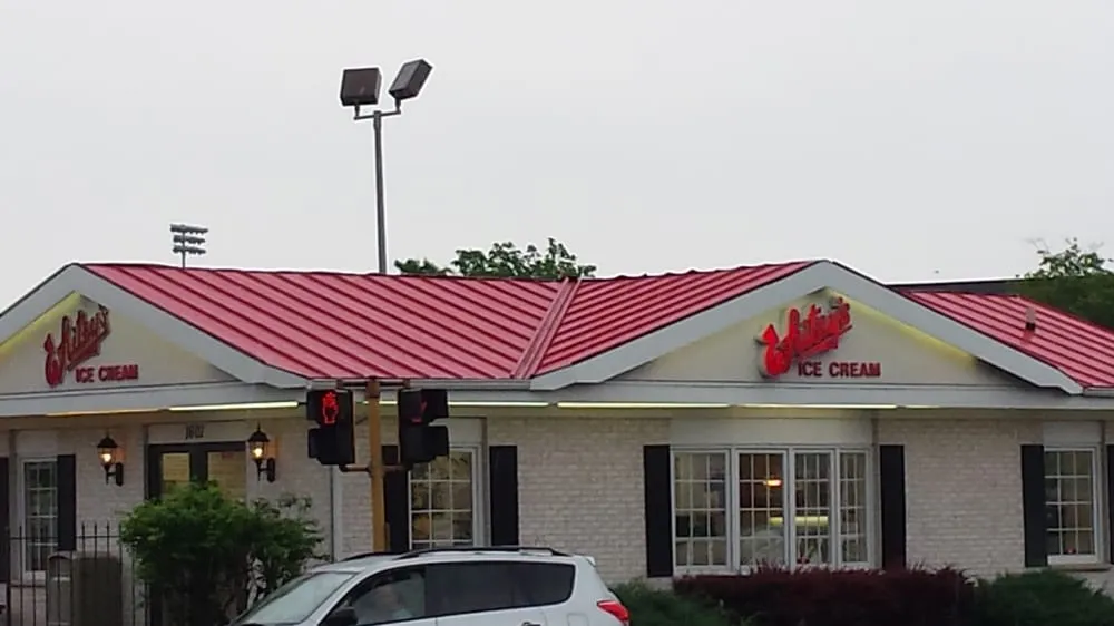 Slide of Olde Town Roofing