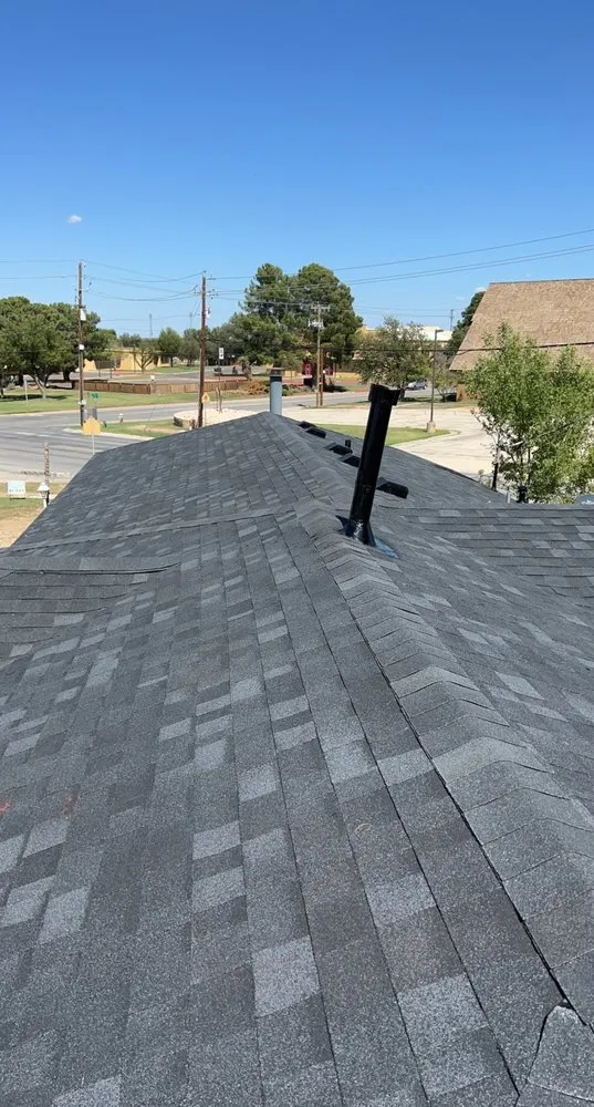 Slide of Olivas Roofing and Solar