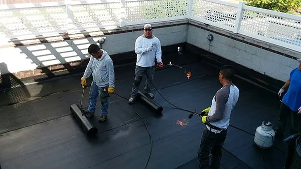 Slide of Olive Tree Roofing and Construction