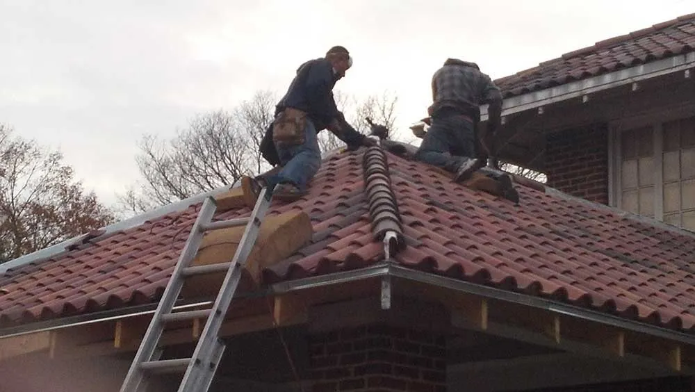 Slide of Oliver's Custom Roofing