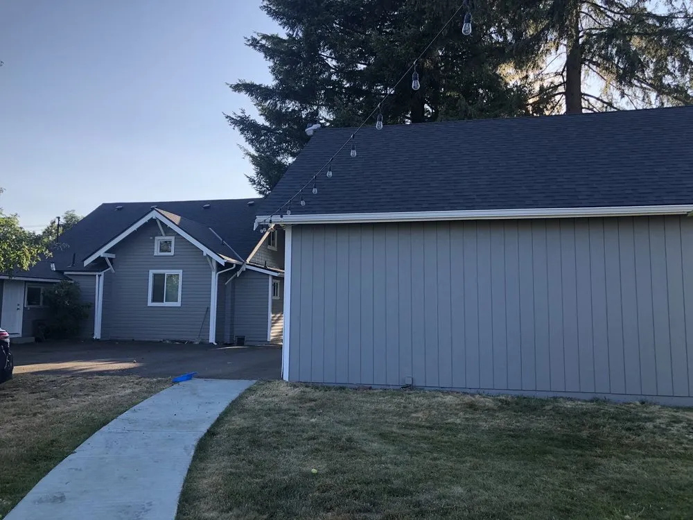 Slide of Olmos Brothers Roofing Company
