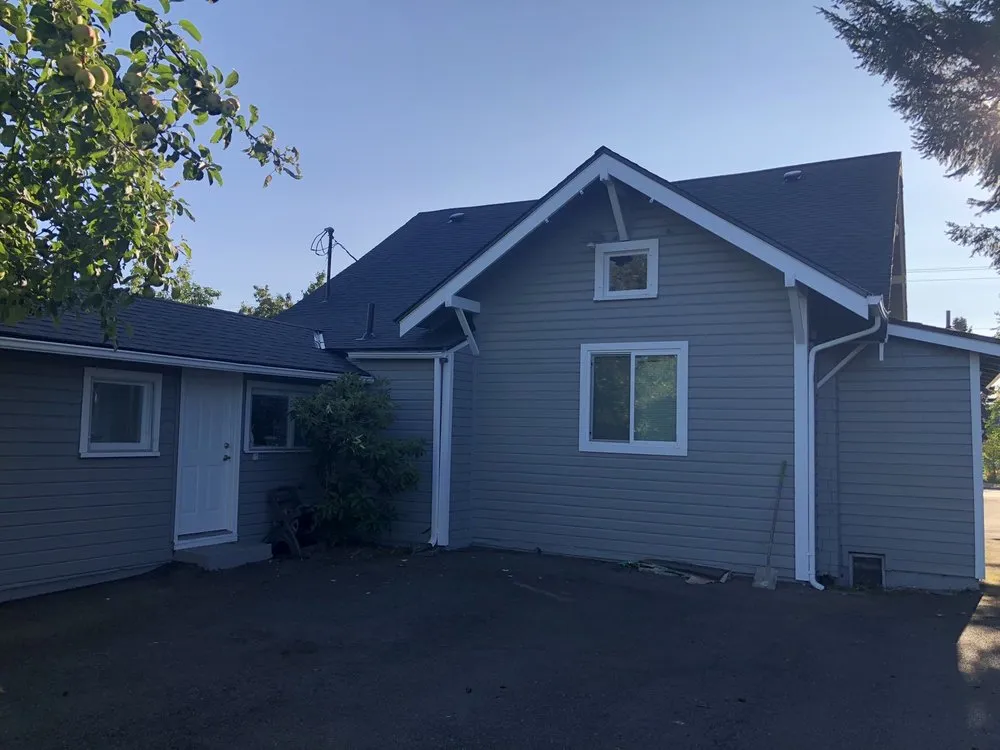 Slide of Olmos Brothers Roofing Company
