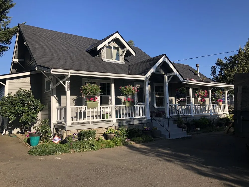 Slide of Olmos Brothers Roofing Company