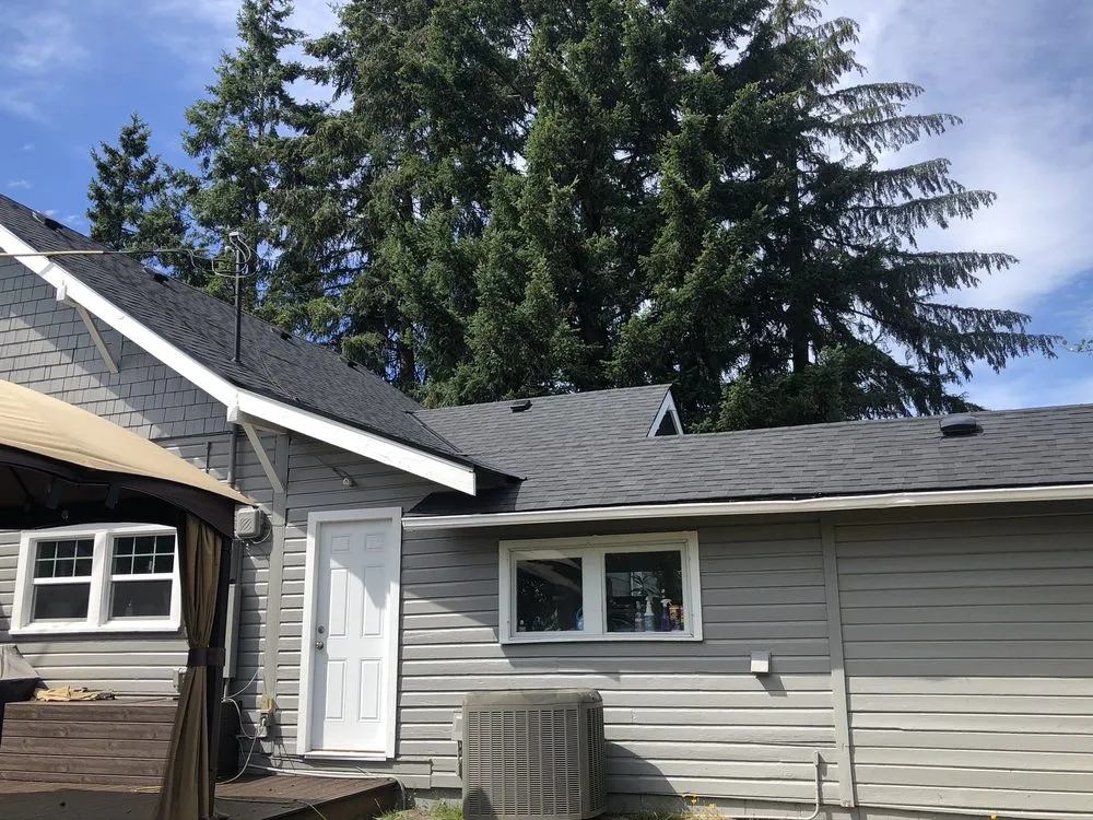 Slide of Olmos Brothers Roofing Company