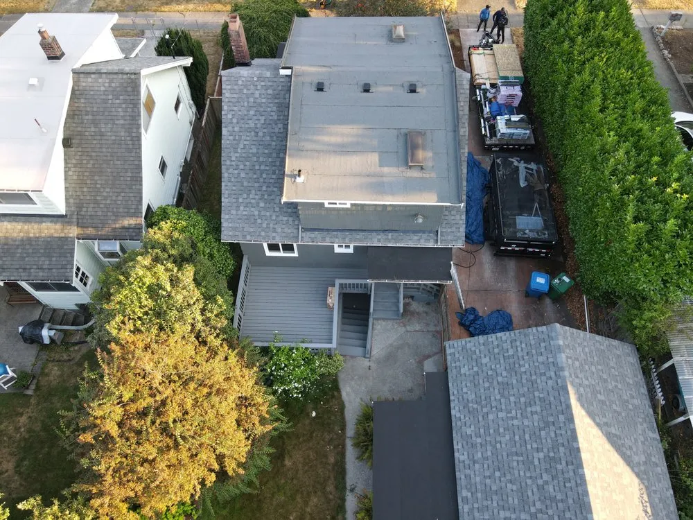 Slide of Olmos Brothers Roofing Company