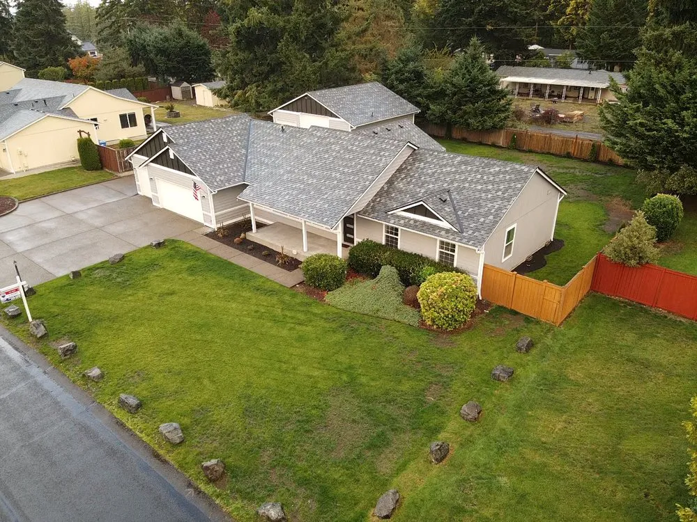 Slide of Olmos Brothers Roofing Company