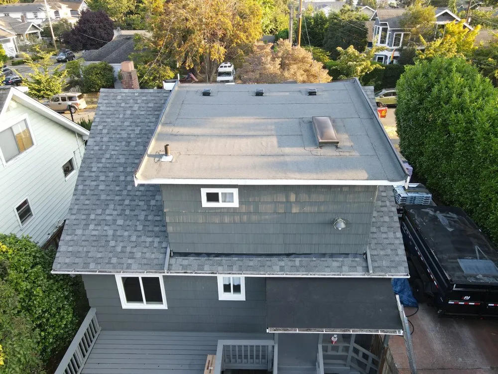 Slide of Olmos Brothers Roofing Company