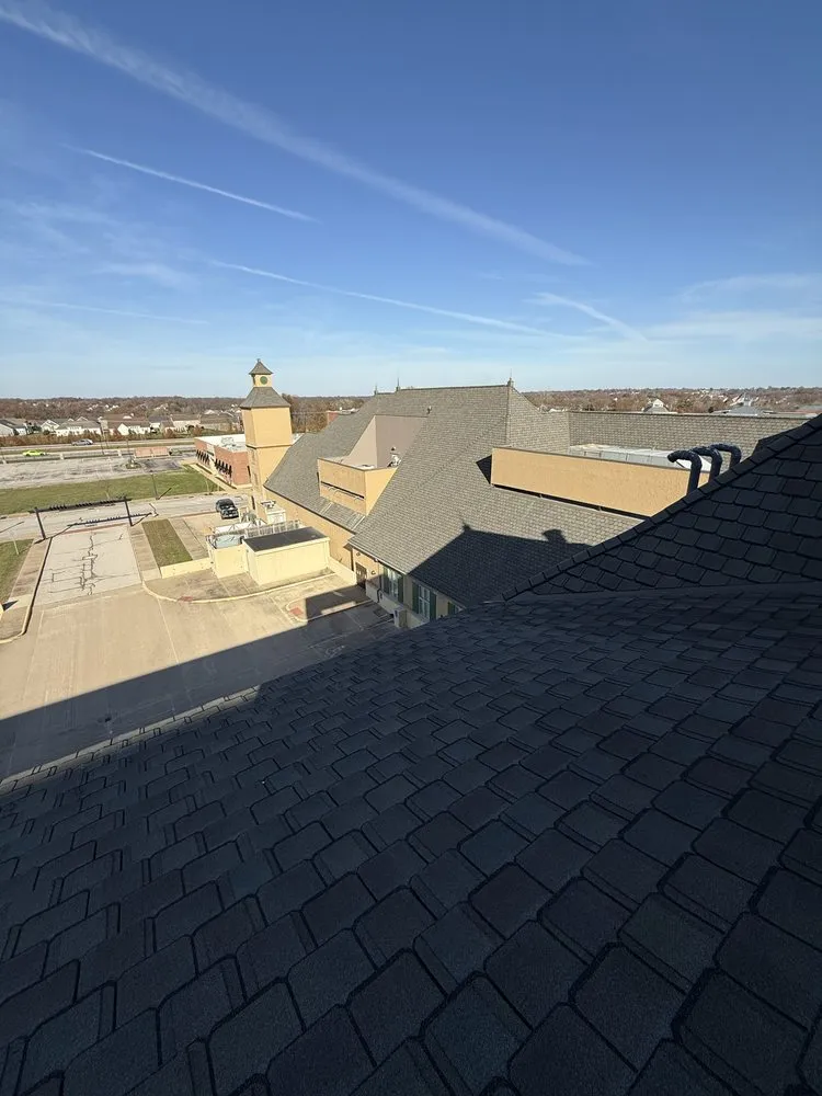 Slide of Olson Roofing Systems