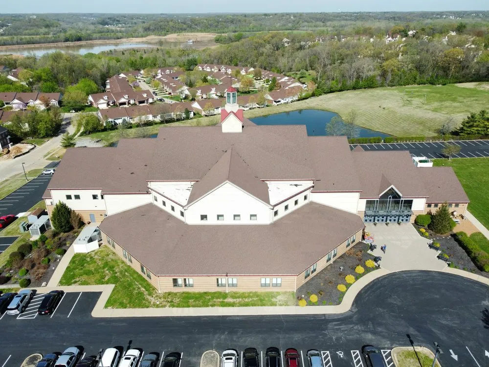 Slide of Olson Roofing Systems