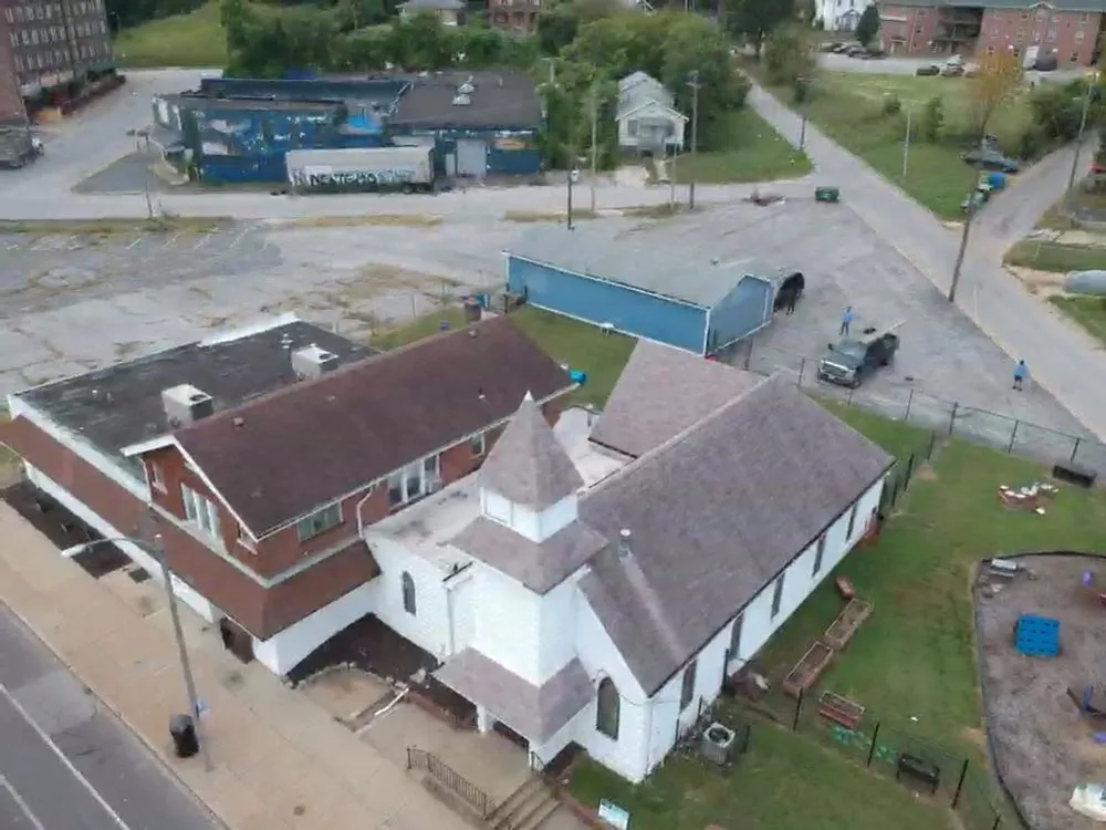 Slide of Olson Roofing Systems