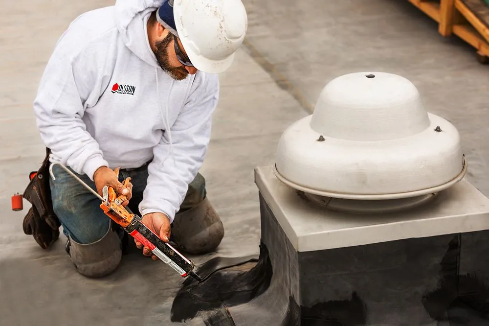 Slide of Olsson Roofing