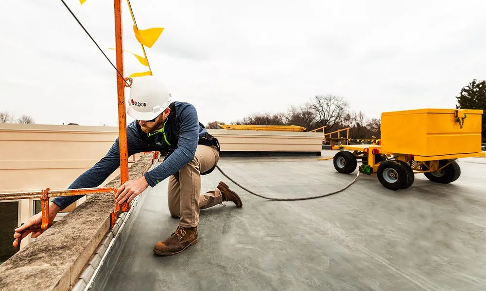 Slide of Olsson Roofing