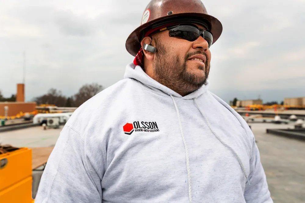 Slide of Olsson Roofing