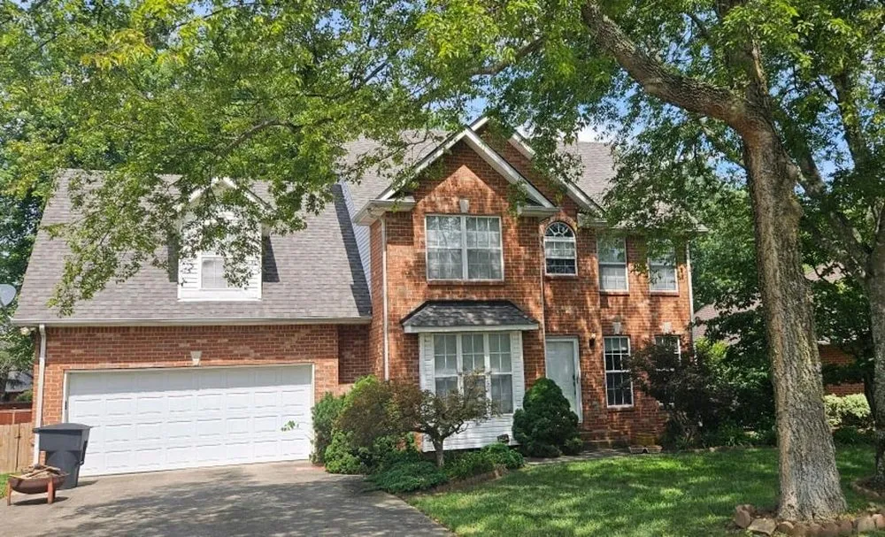 Slide of Oltman Roofing