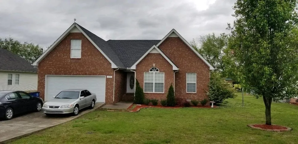 Slide of Oltman Roofing