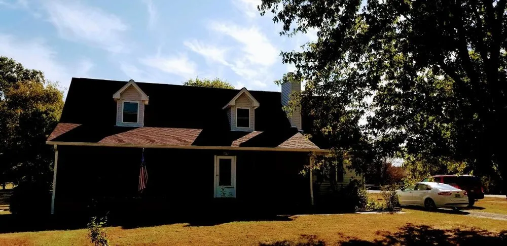 Slide of Oltman Roofing