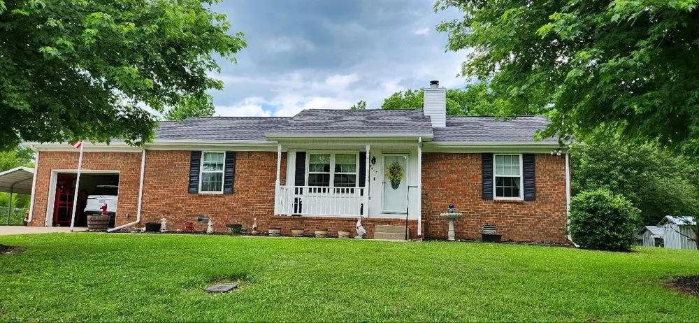 Slide of Oltman Roofing